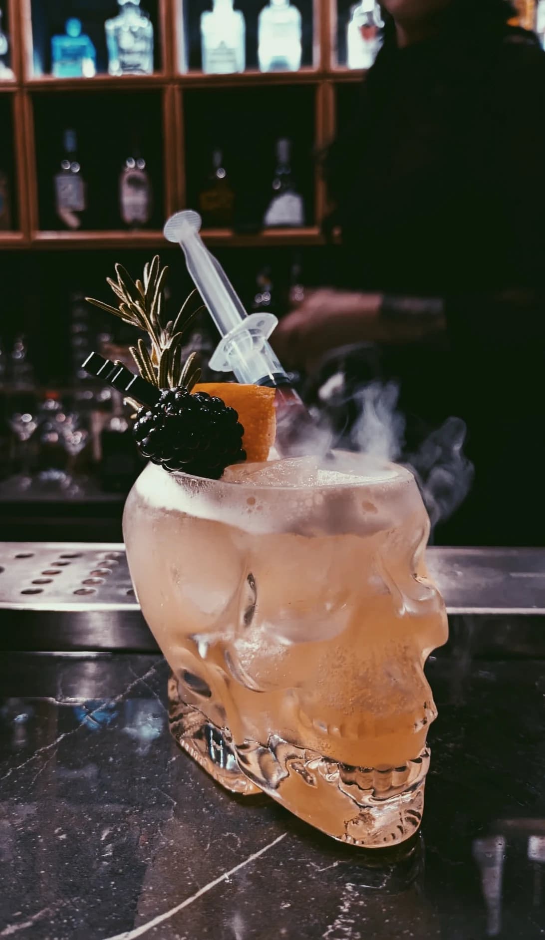 A smoked cocktail served tableside