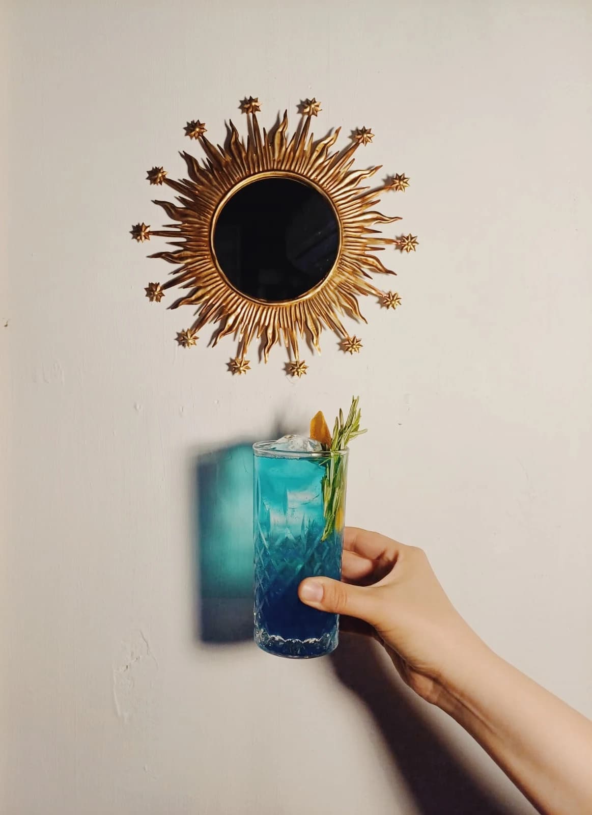 The same blue cocktail from a closer angle