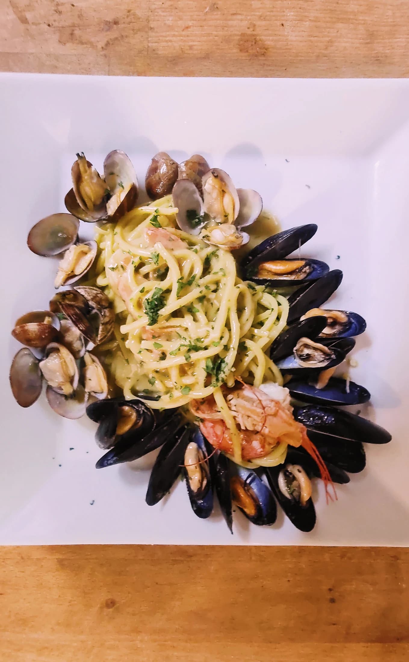 A seafood pasta with mussels and clams