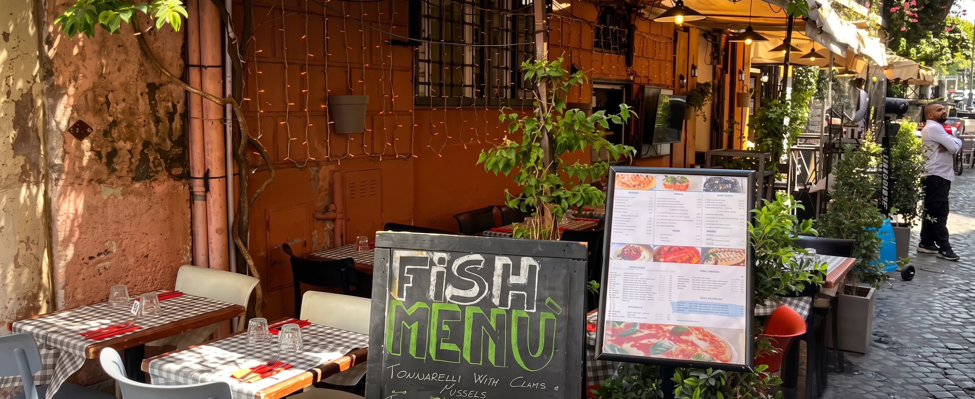 Restaurant entrance on Via Di Ponte Sisto in Rome